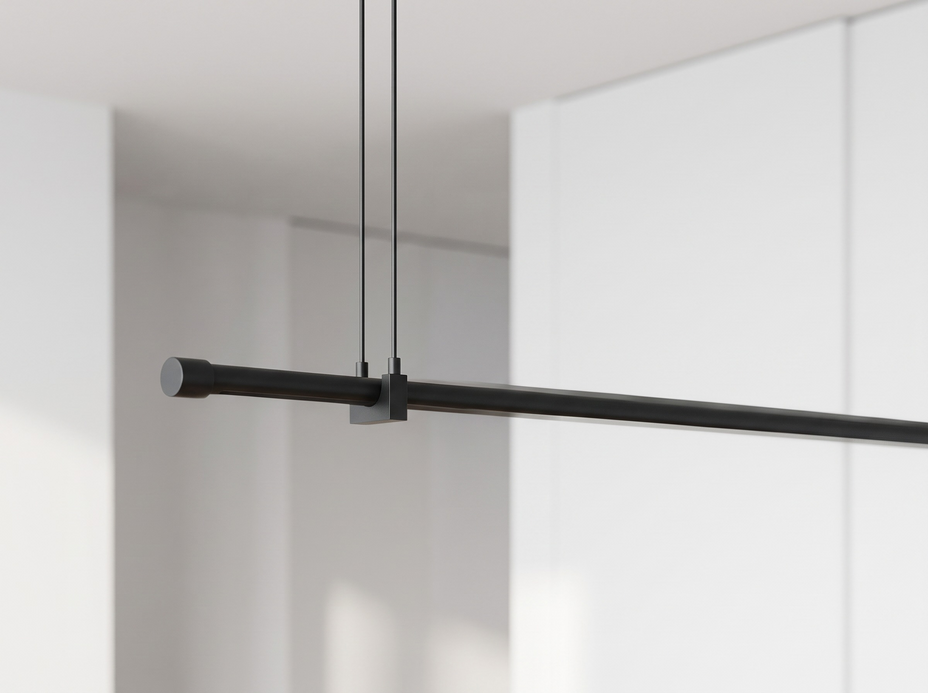 Close up detail of a geometric shaped adjustable black pendant light