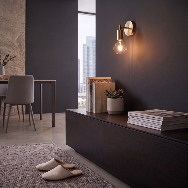 Minimalist Glass Wall Lamp installed as a single brass wall sconce in a modern living room, lifestyle