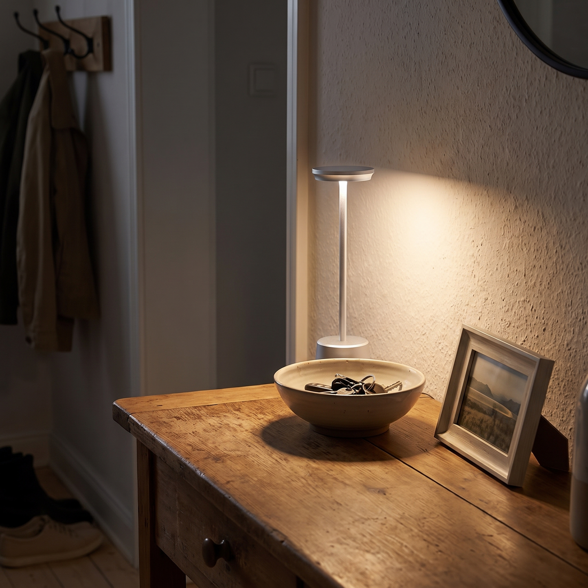 Cordless LED Accent Table Lamp on an entryway console table