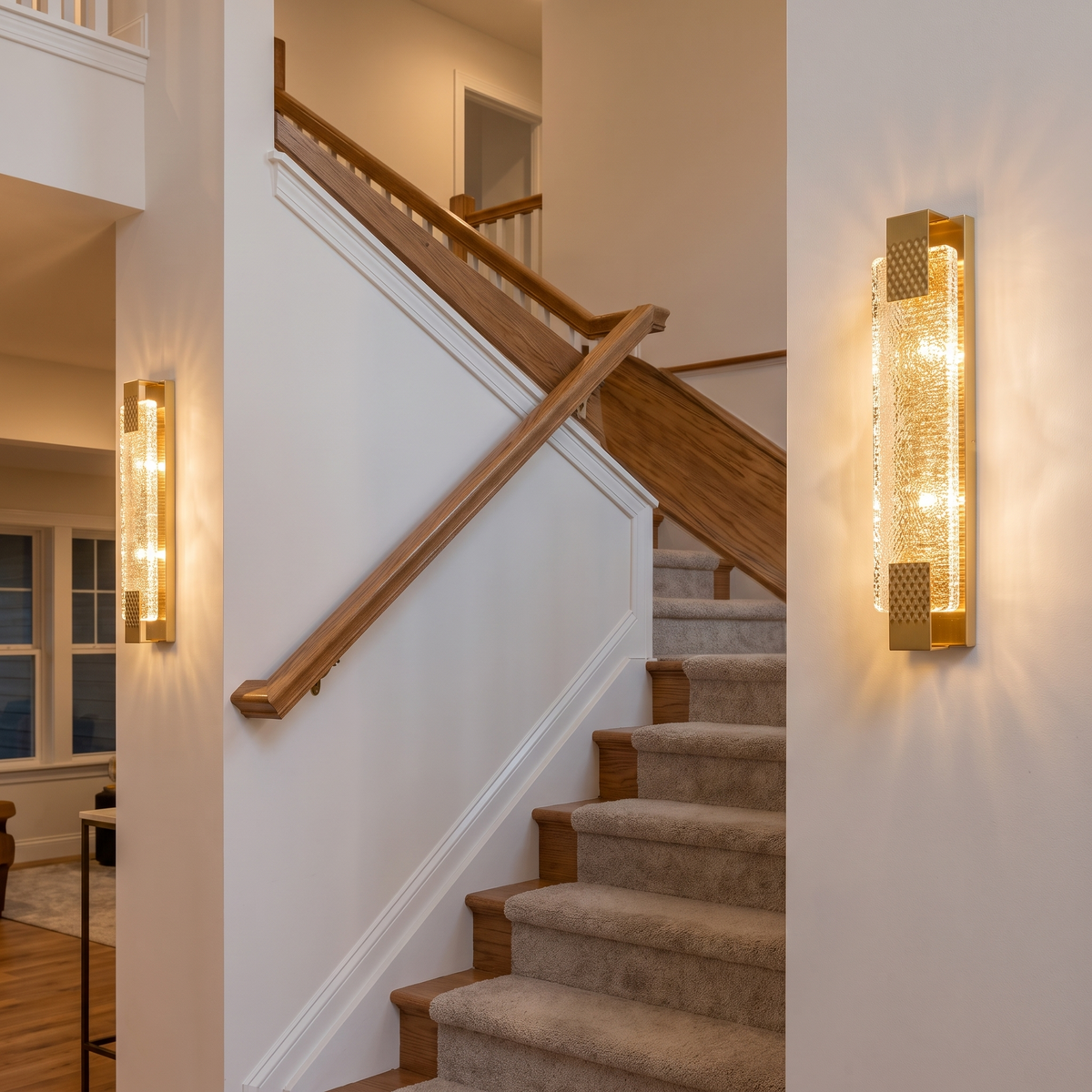 Pair of luxury modern crystal wall lights on staircase wall