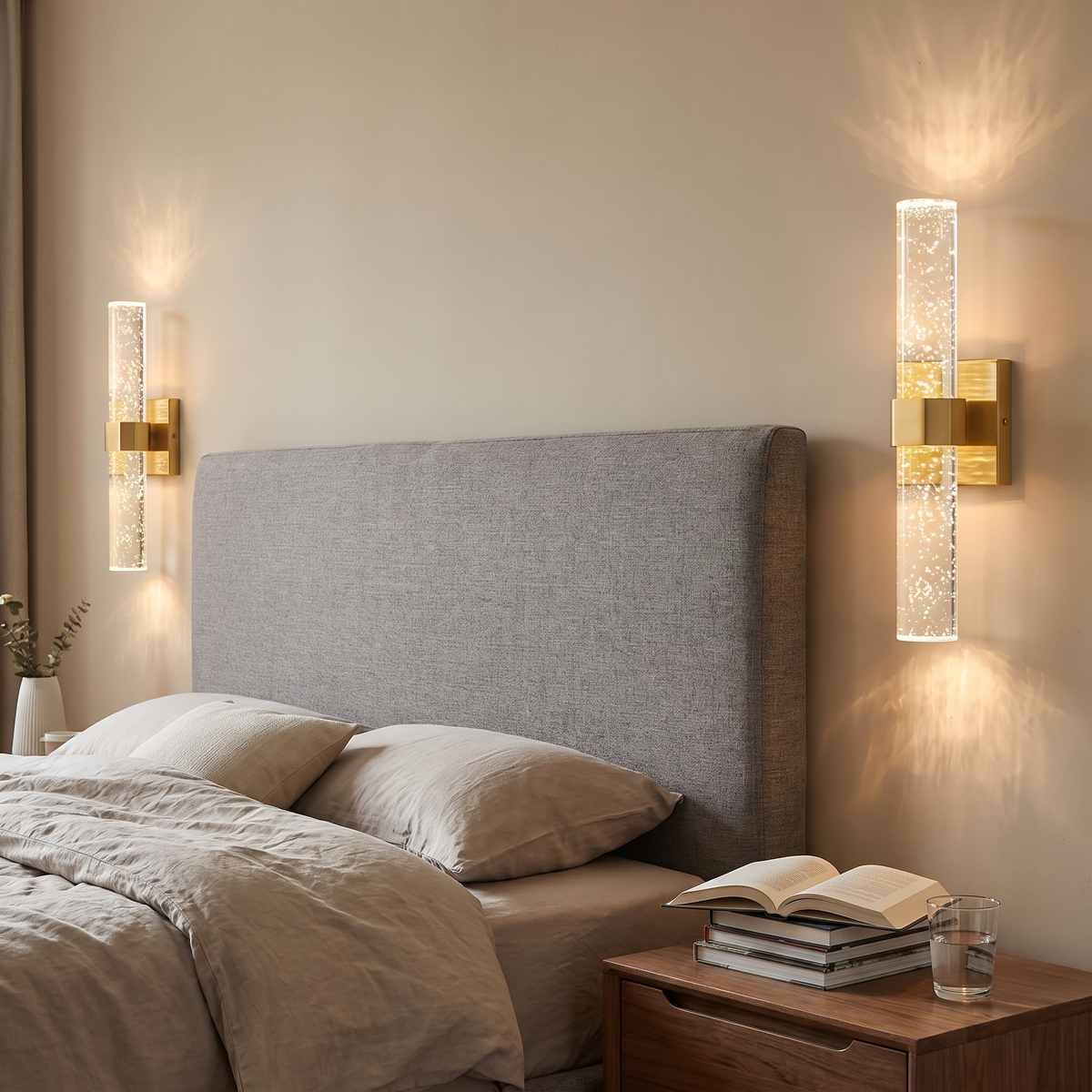 Pair of bubble crystal wall sconces flanking a headboard