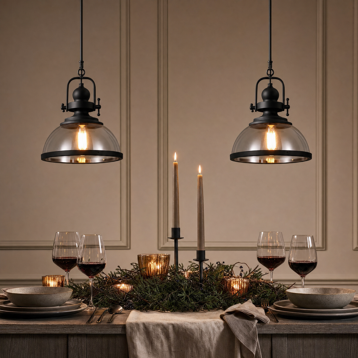 Clear Glass Bowl Pendant Lights over a candlelit dining table