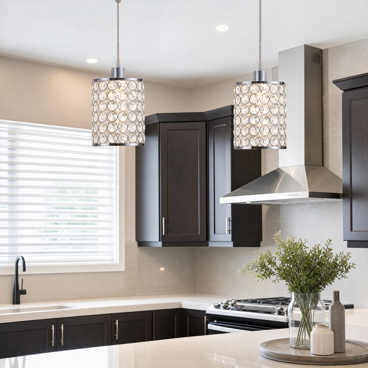 Crystal Cylinder Pendant Lights above a kitchen island
