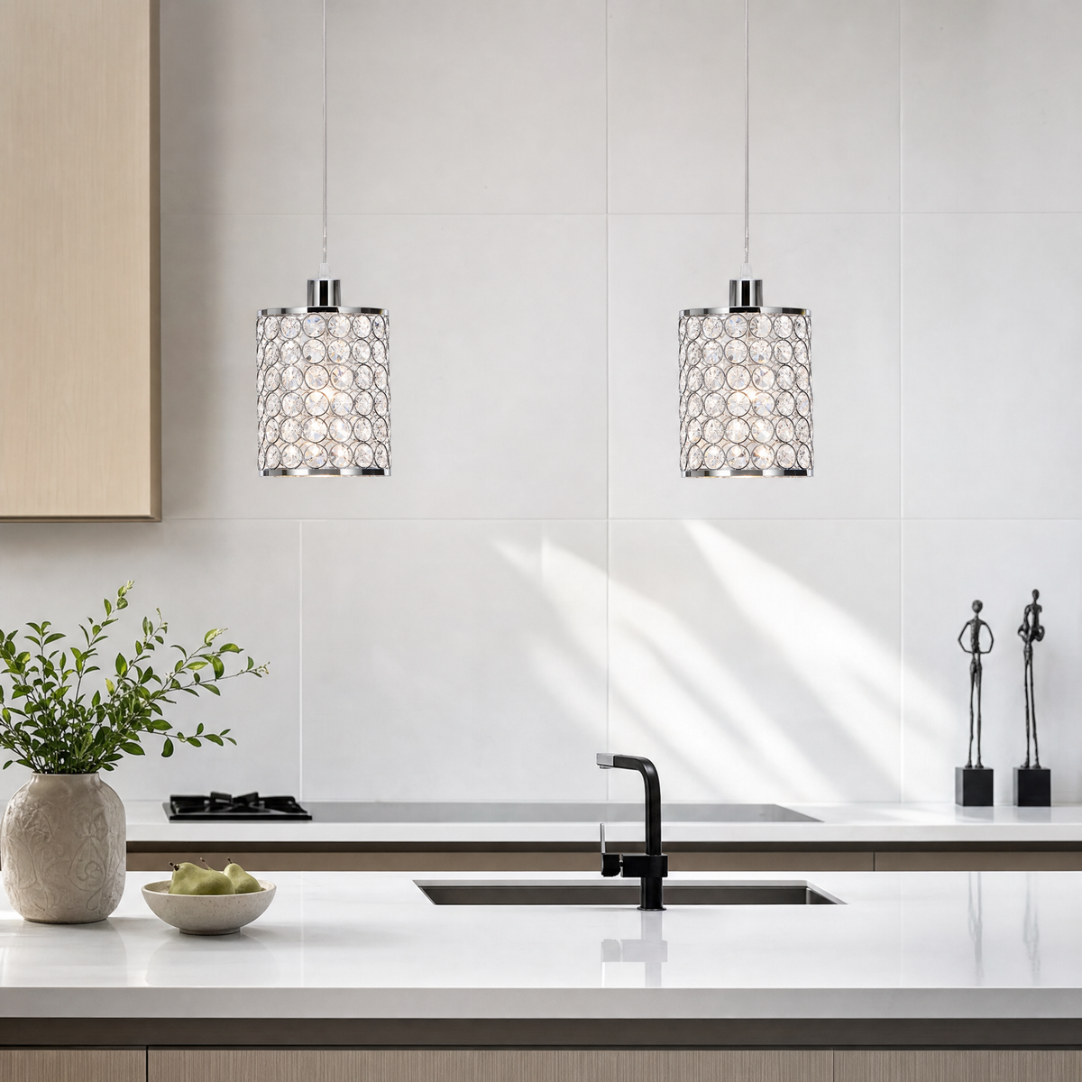 Crystal Cylinder Pendant Lights above a kitchen counter