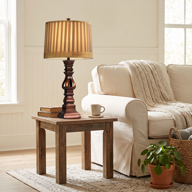 Vintage Wood Tower Table Lamp on a living room side table