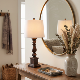 Rustic Bronze Resin Table Lamp on an entryway console table