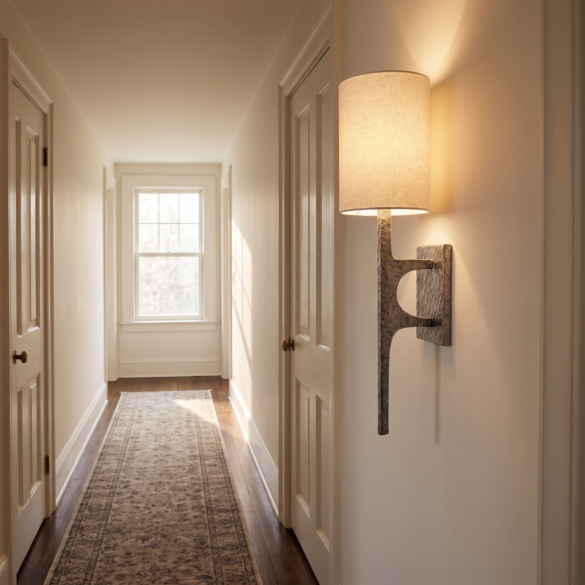 Mavora Hammered Metal Wall Light in an upstairs hallway