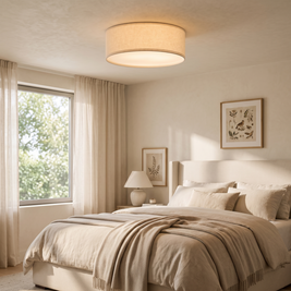 Dumora Linen Drum Flush Mount Light in a primary bedroom