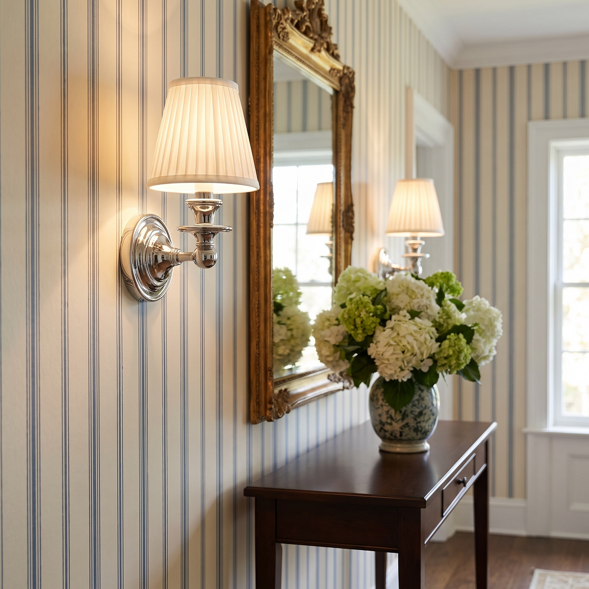 Rowan white pleated shade wall sconce in a hallway