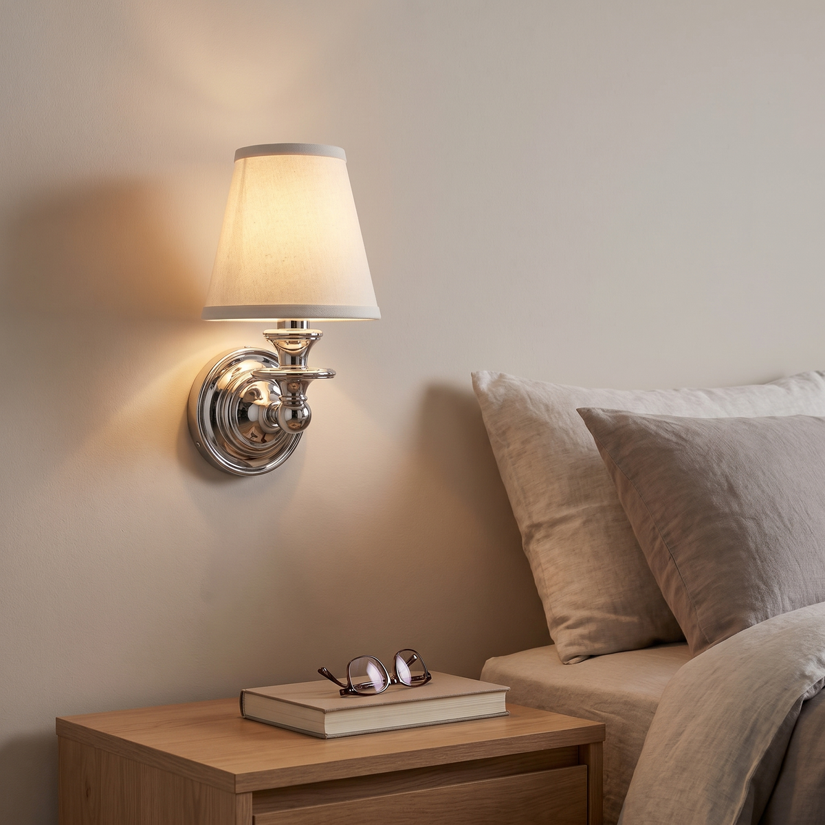 Rowan Drum Shade Wall Sconce above a bedroom nightstand
