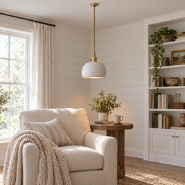 Striped Ceramic Pendant Light, Brass in a reading corner