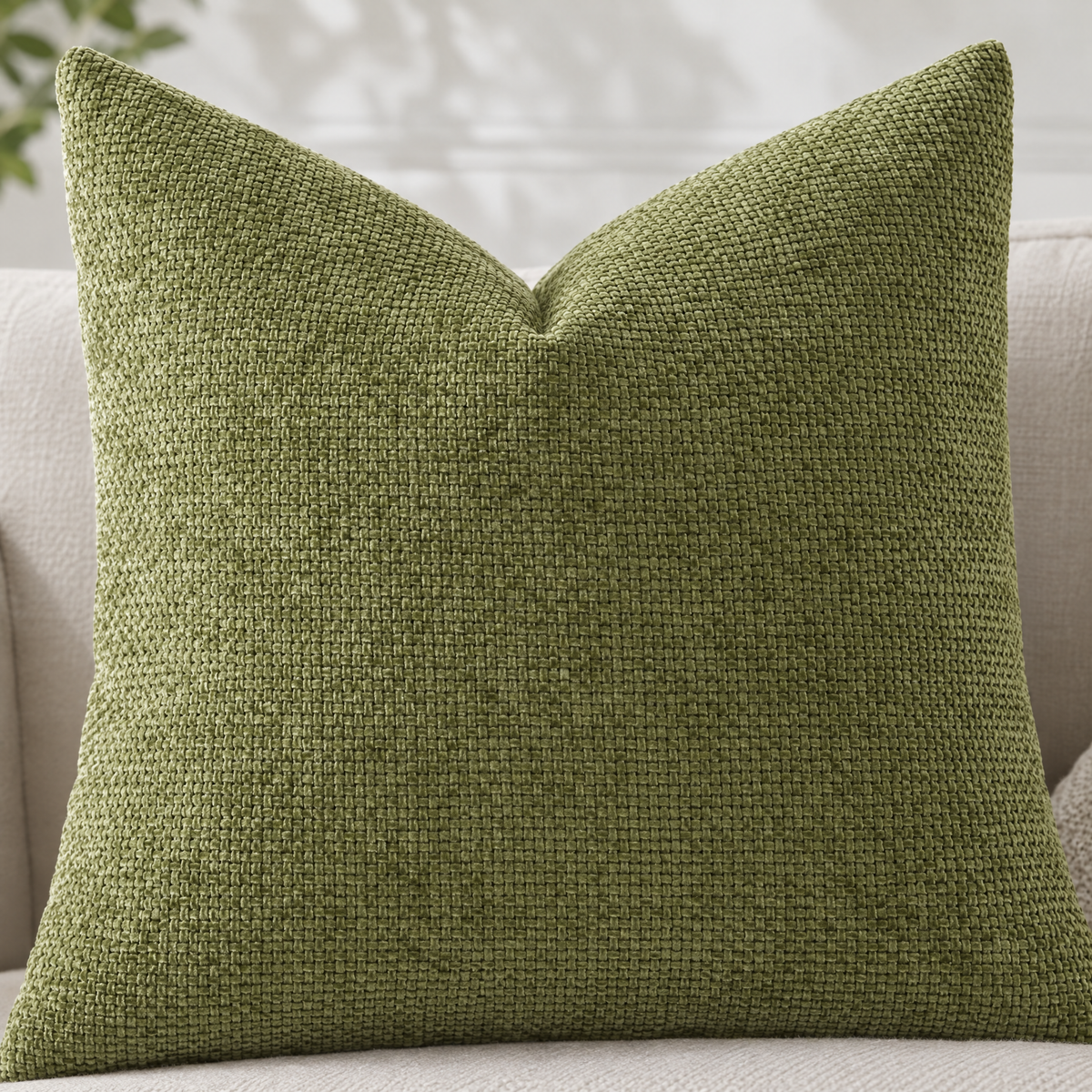 Close-up of Avocado Green chenille basketweave pillow cover texture